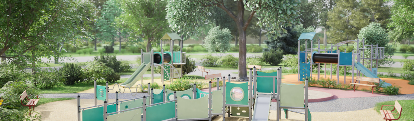 Moderne lekeplass i grønt parkmiljø med flere fargerike lekeapparater, sklier, klatreelementer og sittebenker omgitt av trær og busker.